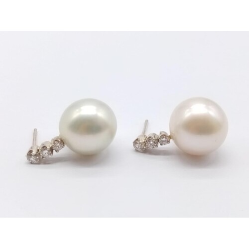 Pair of 18K White Gold Natural Pearl Stud Earrings. 7.71g to...