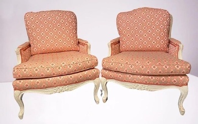 Pair of Louis XVI painted bergère or lounge chairs. Scalamandre upholstery sits on this wonderfully