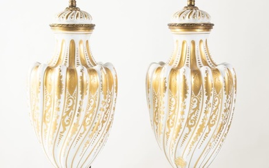 Paire de vases en porcelaine peinte dorée avec appliques en bronze, ancienne manufacture de Sèvres,...