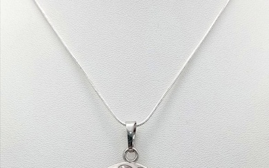 Pendentif ovale en améthyste sur un collier en argent 925. 5cm et 42cm.