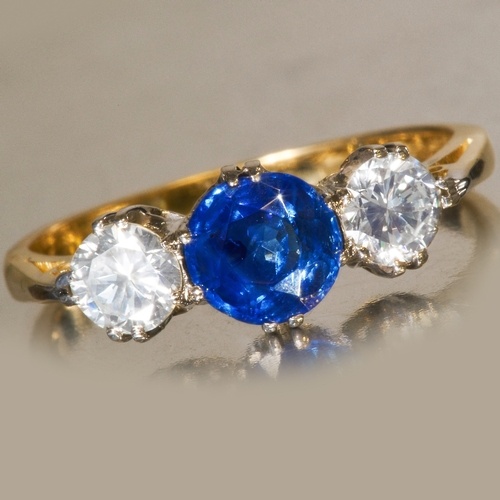 SAPPHIRE AND DIAMOND 3-STONE RING, High carat gold. Gemstone...