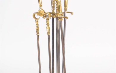 SET OF VICTORIAN CAST BRASS AND STEEL FIRE TOOLS Height: 33 1/2 in. (85.1 cm.)