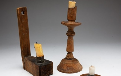 THREE WOOD CANDLESTICKS AND HOLDERS.