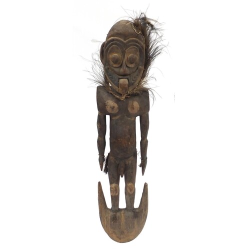 Tribal Sepik River painted wood male ancestor figure from Pa...