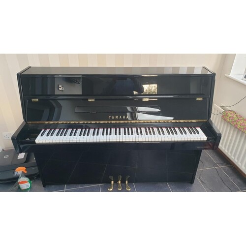 Yamaha (c2000) A Model C110A upright piano in a modern style...