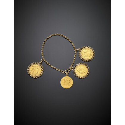Yellow gold chain bracelet with three coin and one medal as charms, g 42.90 circa, length cm 19.50 circa. (slight…Read more