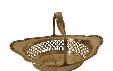 1 Basket in silver openwork, with handle.