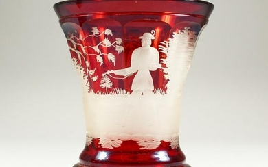 A BOHEMIAN RED TINTED BEAKER-VASE, etched with a bear