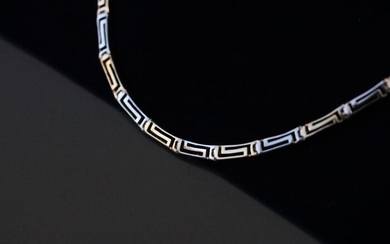 14 kt. White gold, Yellow gold - chain in a Greek key pattern, fully hallmarked, 17 inches long, weight 11.5 Grams