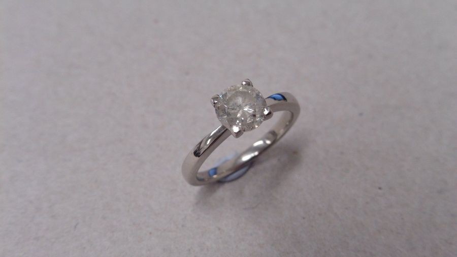 1.67ct diamond solitaire ring set in platinum. Enchanced...