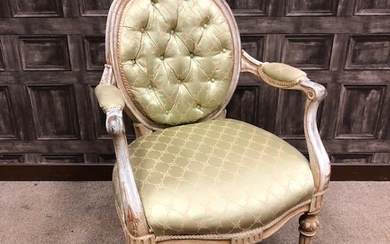 A FRENCH STYLE ARMCHAIR