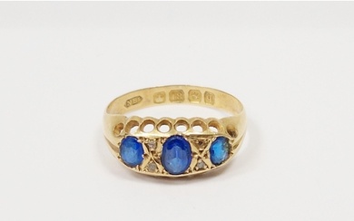 18ct gold and blue stone ring set three oval facet-cut gradu...