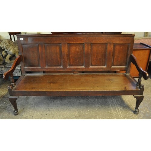 18th Century English oak panel backed settle, the moulded to...