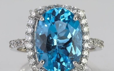 Blue topaz, diamond and 14k white gold ring