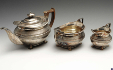A George III silver three piece tea service.