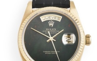 Rolex: A gentleman's wristwatch of 18k gold. Model Day-Date, ref. 18000. Mechanical movement with automatic winding, cal. 3055. 1979–1980.