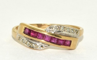 9ct gold ladies Diamond and Ruby cross over ring size R