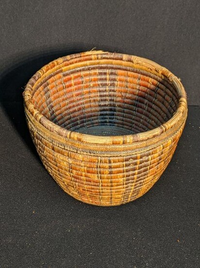 A 19th century tribal Oceanic food storage basket with