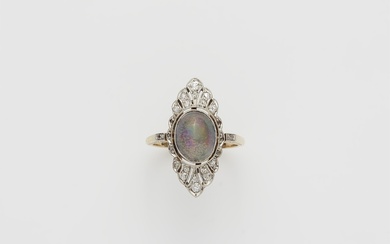 A Belle Epoque 14k gold platinum diamond and opal cabochon Marquise ring.