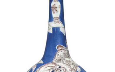 A CHINESE POWDER-BLUE AND COPPER-RED-DECORATED BOTTLE VASE, KANGXI PERIOD (1662-1722)