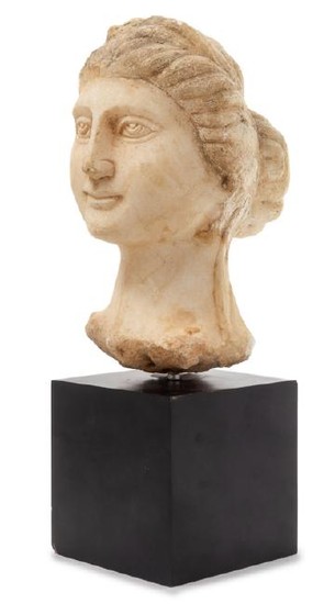 A Carved Marble Head of a Woman