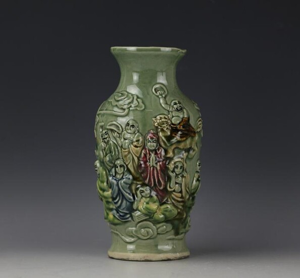 A Chinese Celadon-Glazed 18 Luohan Monks Vase