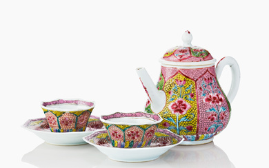 A Chinese Famille Rose Teapot and Cover and Two Cups and Saucers