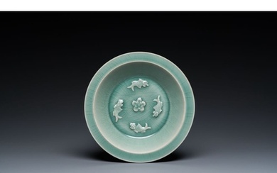 A Chinese Longquan celadon 'four carps' plate, Yuan or later...