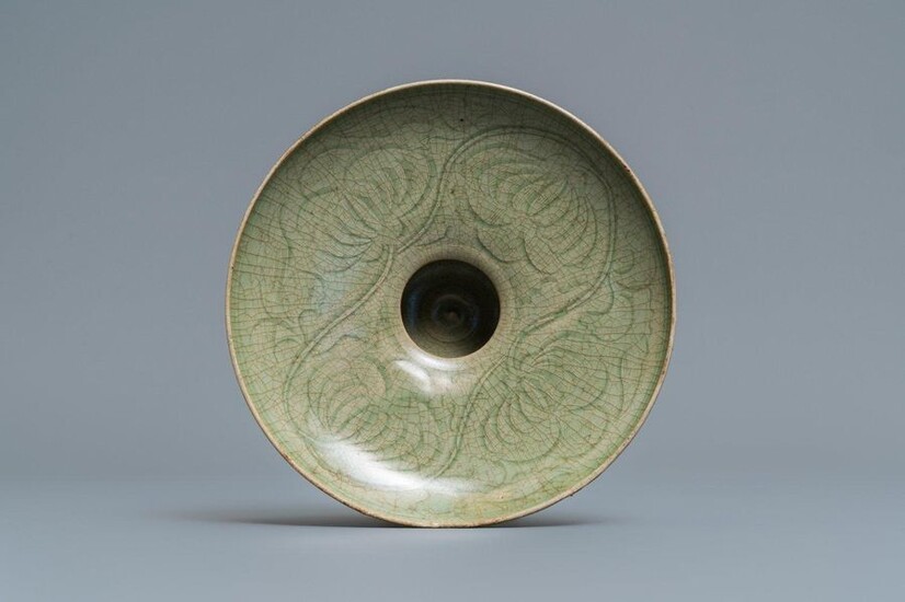 A Chinese Yaozhou celadon bowl with incised floral...