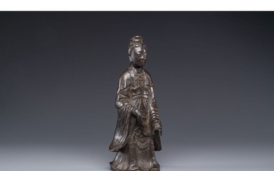 A Chinese bronze figure of a standing Guanyin, Ming H.: 33 c...