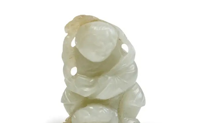 A Chinese pale green jade carving of Liu Hai and his toad...
