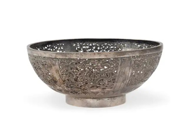 A Chinese silver bowl Early 20th century The sides pierced and repousse...