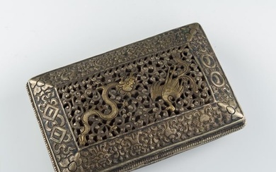 A Chinese silver box with carved 'phoenix' motif, 19th century