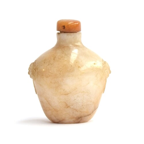 A Chinese white and russet jade snuff bottle, flattened ovoi...
