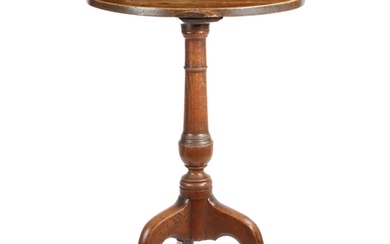 A George III ash and oak tripod table, circa 1780 Having a...
