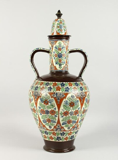 A LARGE TURKISH POTTERY TWO-HANDLED VASE AND COVER.