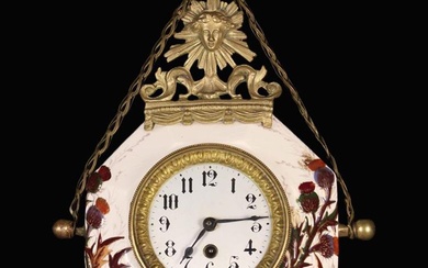A Late 19th Century Ceramic Cartel Clock. The octagonal cushion-moulded ceramic case decorated with