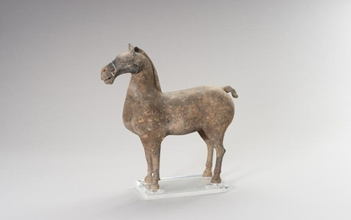 A PAINTED POTTERY FIGURE OF A HORSE WITH OXFORD TEST