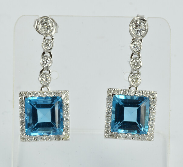 A PAIR OF BLUE TOPAZ, DIAMOND AND 9ct WHITE GOLD DROP EARRINGS