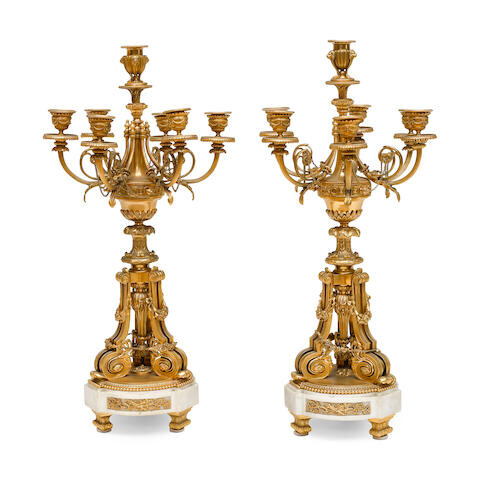 A PAIR OF LOUIS XVI STYLE GILT BRONZE AND MARBLE SEVEN-LIGHT CANDELABRA