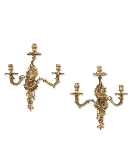A PAIR OF REGENCE ORMOLU THREE-BRANCH WALL-LIGHTS ATTRIBUTED TO ANDRE-CHARLES...