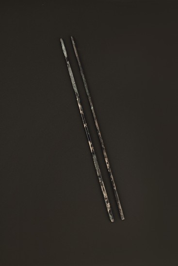 A PAIR OF SILVERY METAL CHOPSTICKS, TANG DYNASTY OR LATER