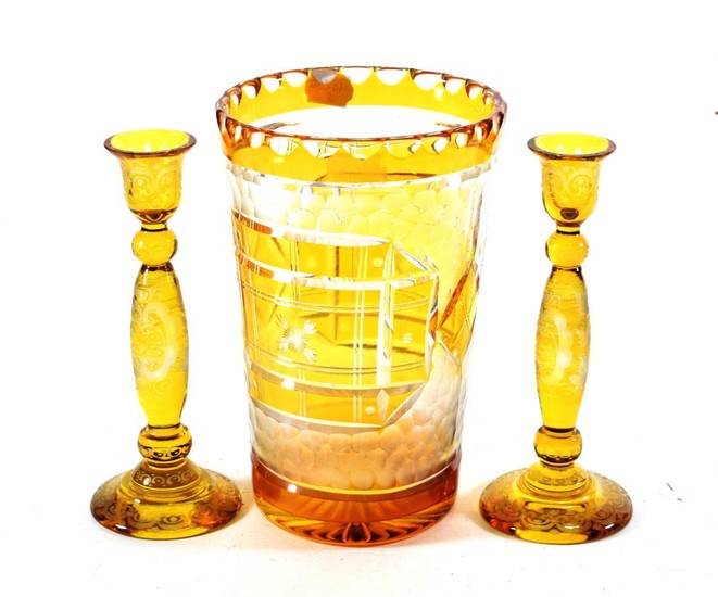 A Pair of Bohemian Amber Flashed Clear Glass Candlesticks, late...