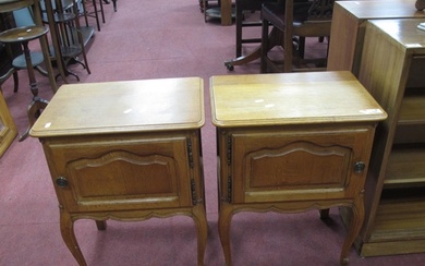 A Pair of French Style Oak Bedside Cabinets, the tops with m...