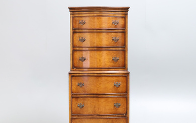 A REPRODUX WALNUT VENEERED SERPENTINE FRONTED TALLBOY CHEST, IN MID-18TH CENTURY STYLE.