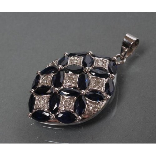 A SAPPHIRE AND DIAMOND PENDANT of eliptical form, the marqui...