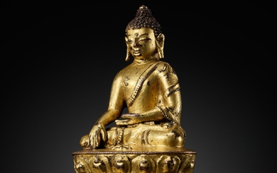 A SMALL GILT BRONZE FIGURE OF BUDDHA VAJRASANA, TIBET, 16TH CENTURY