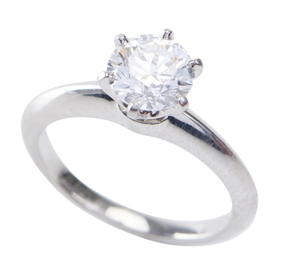 A SOLITAIRE DIAMOND RING BY TIFFANY & CO