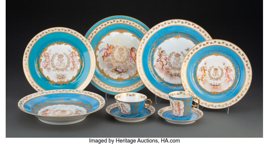 A Seventy-Four-Piece Sèvres Chateau des Tuileries Partial Gilt Porcelain Married Dinner Service (1844-1867)