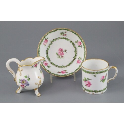 A Sevres cream jug, c.1768, and a Sevres hard paste coffee c...